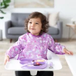 Bumkins Αδιάβροχη σαλιάρα με μακρυά μανίκια SLEEVED BIB UNICORNS